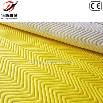 Machine de couverture par ordinateur à navettes à aiguilles multiples